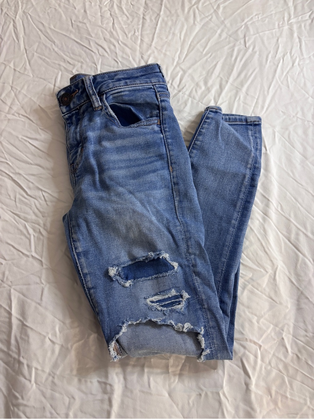 American Eagle Outfitters Light Blue Distressed Skinny Jeans